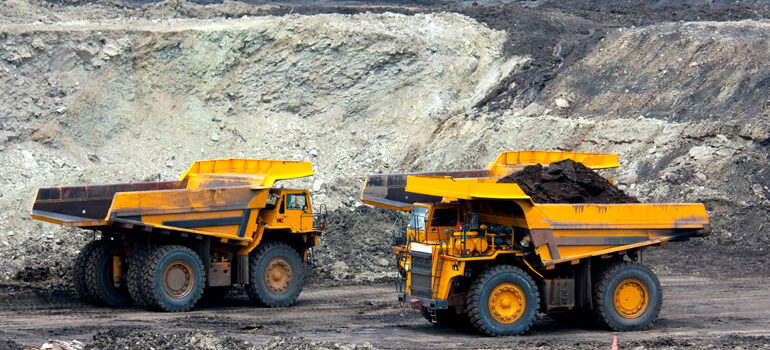 Heavy mining vehicles operating in a South African mine